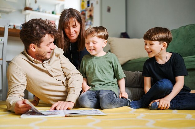 happy-family-with-two-little-sons-reading-story-indoors-parents-with-children-spending-time-together-and-lying-on-the-floor-at-home_155404-1375.png happy-family-with-two-little-sons-reading-story-indoors-parents-with-children-spending-time-together-and-lying-on-the-floor-at-home_155404-1375.png